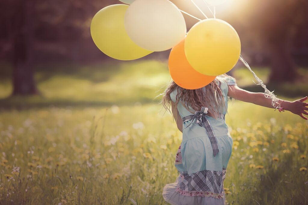 woman with yellow ballons